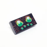 Lego Parts: Tile, Decorated 1 x 2 with HARRY POTTER (Spider Face Pattern - Green Eyes and 4 Green Dots with Brown Hairs)