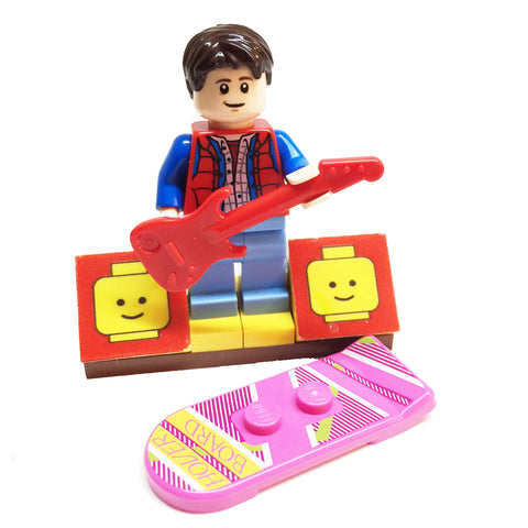 MinifigurePacks: Lego Back to the Future Bundle (1) Marty McFly Minifigure - Cuusoo Variant (1) Figure Display Base (2) Figure Accessory's (Hover Board - Electric Guitar)