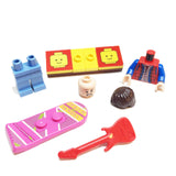 MinifigurePacks: Lego Back to the Future Bundle (1) Marty McFly Minifigure - Cuusoo Variant (1) Figure Display Base (2) Figure Accessory's (Hover Board - Electric Guitar)