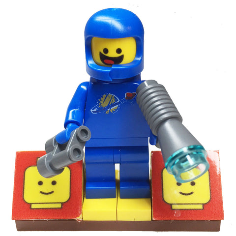 MinifigurePacks: Lego Movie Bundle (1) Benny Minifigure (1) Figure Display Base (3) Figure Accessory's (Oxygen Tanks - Binoculars - Vintage Space Gun)